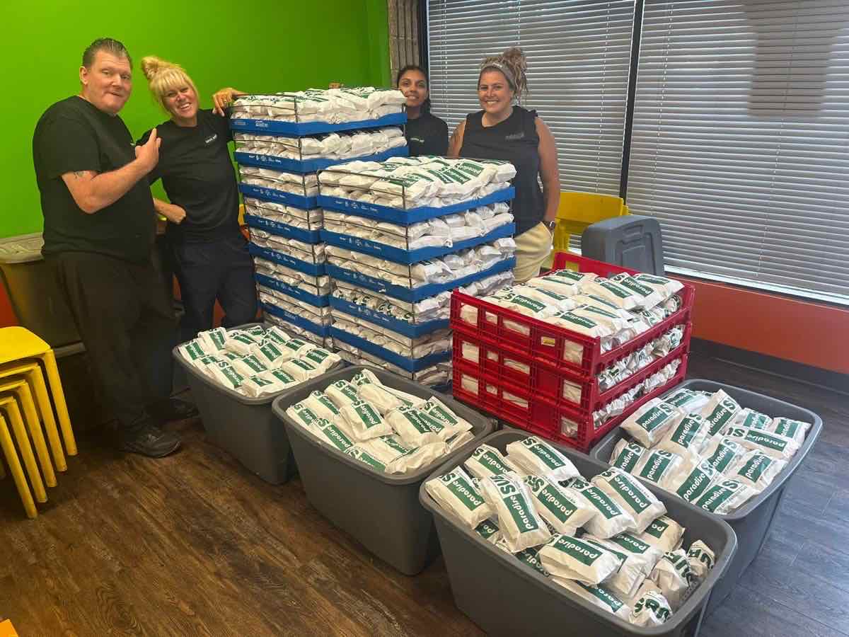 Paradise Subs staff with crates of fresh bread for a community donation